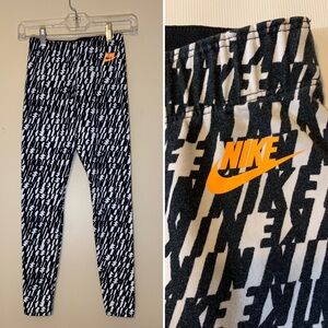 Nike Black and White Leggings with Orange Logo